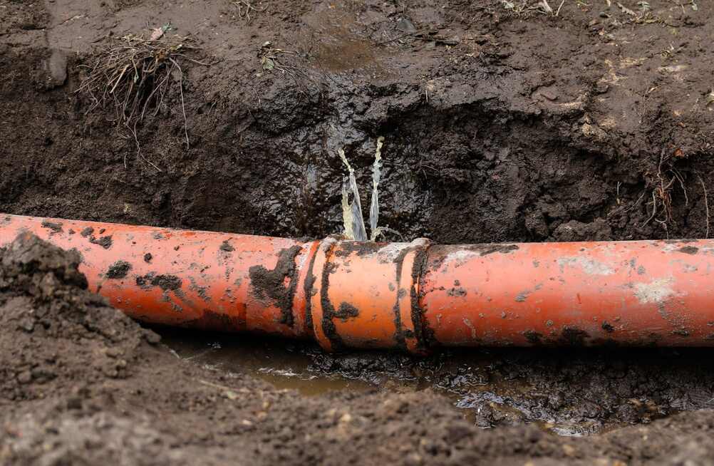 leaking underground sewer pipe